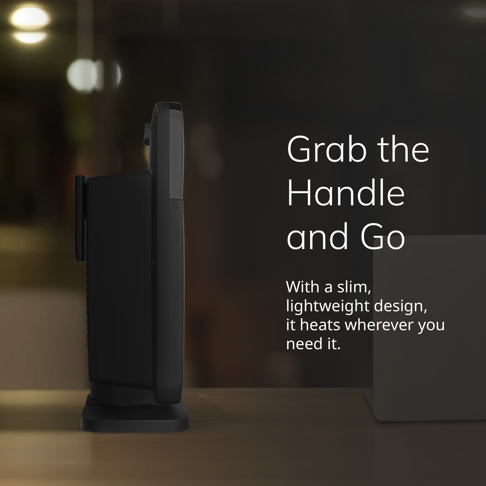 Black Lasko MyHeat Max CD09101 tabletop ceramic heater in side profile with an integrated carry handle.